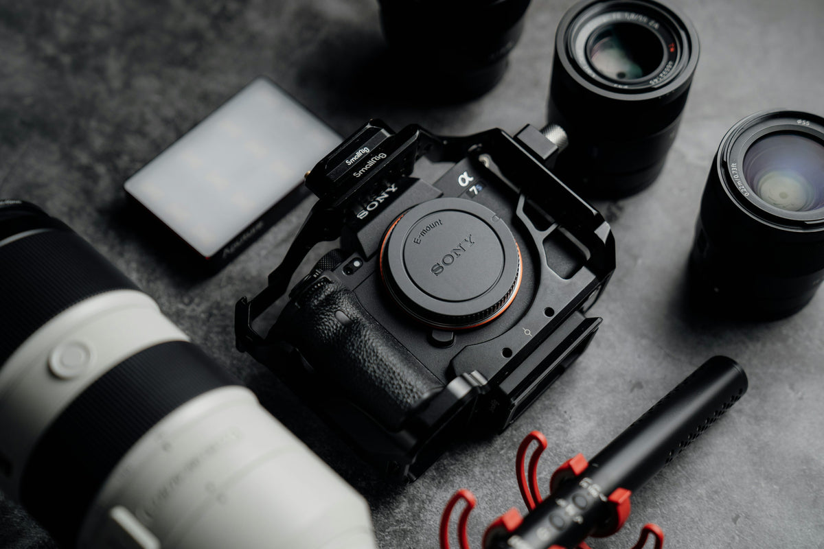 Professional content creation equipment including camera, lenses and microphone.