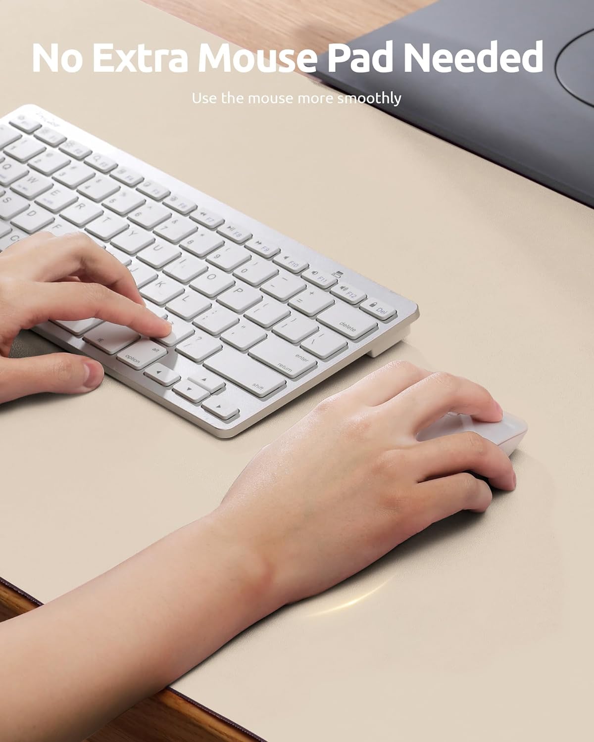 Person using a wireless keyboard and mouse on a desk with text 'No Extra Mouse Pad Needed'.